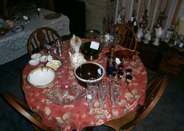Glassware, bowls, trays and more!  Individually priced or make an offer on the lot.  Dining room table available (solid wood), plus chairs and 3 leaves - asking $75.  