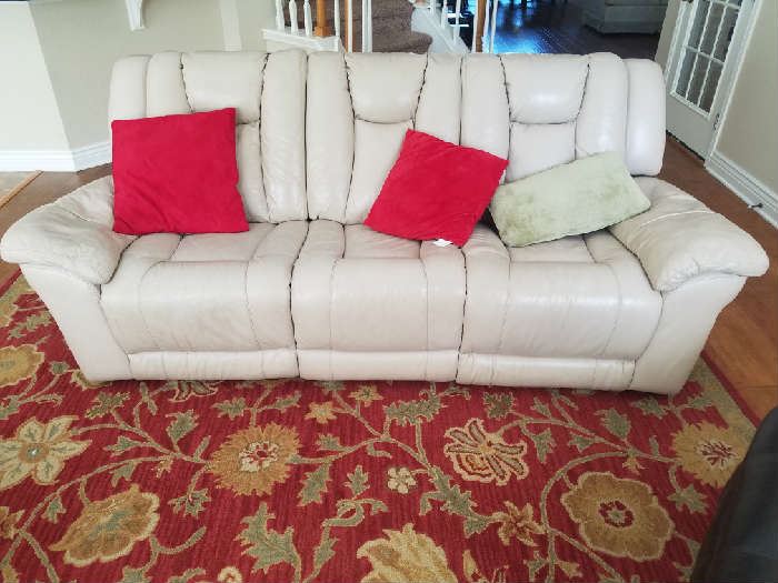 Leather sofa with reclining chairs