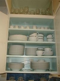 sets of dishes everywhere in the house, upstairs, downstairs, living room, kitchen ........