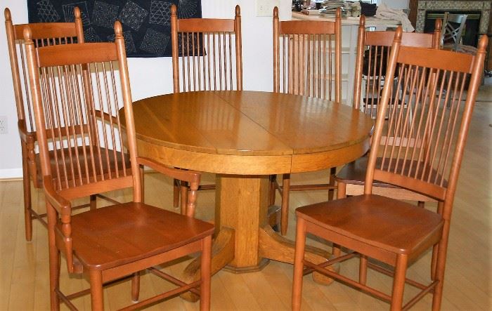 Oak Round Table; 6 Cherry “Spindle” Chairs (2 w/Arms)