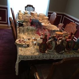 collectors' liquor bottles, china set, glassware, table linen, etc.