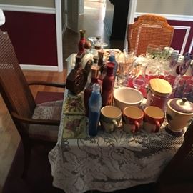 collectors' liquor bottles, china set, glassware, table linen, etc.   