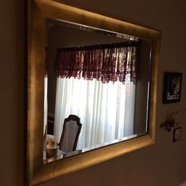 gold framed beveled mirror