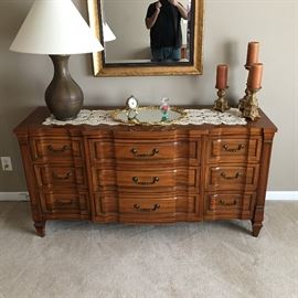 VINTAGE KENT COFFEY SAVONA 9-DRAWER DRESSER, lamp, set of candle holders, gold mirror vanity tray, clock w/stand, framed beveled mirror