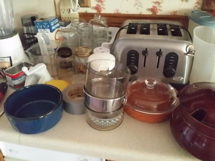 toaster, bowls, glass cake pans and plates