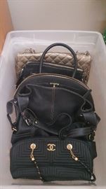 Assortment of handbags. There are many!