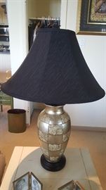 Black and Gold Lamp on Creme End Table