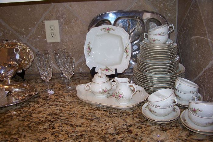 A beautiful set of Rosenthal china - service for 8 including dinner plates, salad plates, bread and butter plates, cups and saucers, veg. bowl, platter and 8 cups and saucers