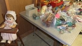 doll and high chair, playhouse dishes, doll house furniture