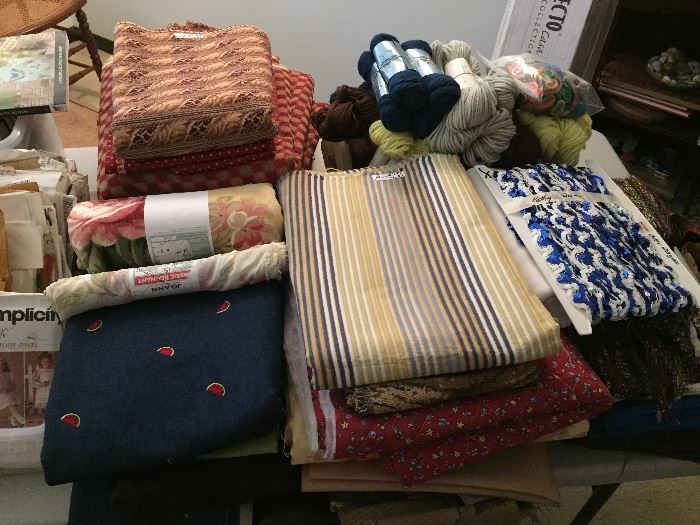 Fabric.  $3 yard.  Upholstery fabric $5 yard. Reels of ribbon, patterns, trim.  Fat quarters.