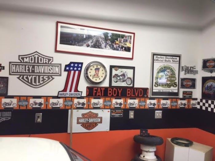 Piles of harley davidson collectables 