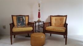 Vintage caned chairs and vintage leather footstool
