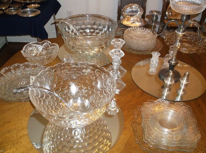 Two punch bowls and pressed glass