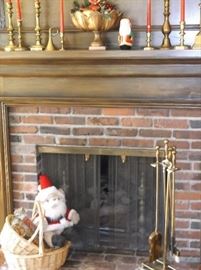 Brass fireplace tools and candlesticks
