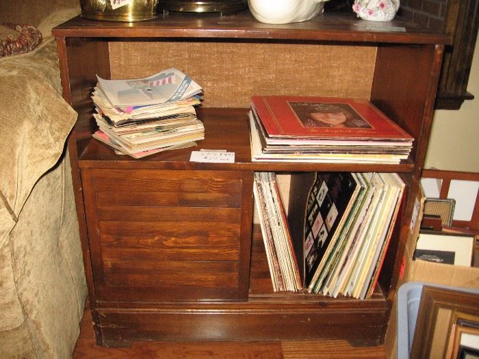 Record cabinet with a few of the LP's and 45 rpm records