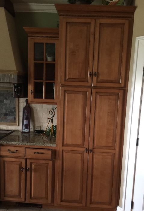 Another view of the kitchen cabinets.