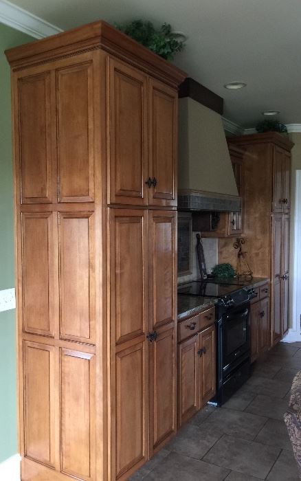 Another angle showing cabinet designs and height.