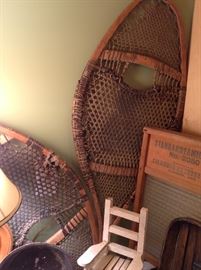 Closer look at the vintage snow shoes and old glass washboard. 