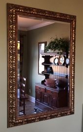 Beautiful Framed Mirrors located in many rooms ranging from an oversized full length mirror (in Master Onsuite) to an assortment of sizes hanging on walls, over sinks, in office. All for sale! 