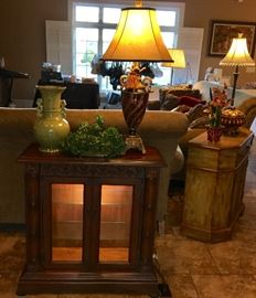 Unusual smaller size lighted cabinet