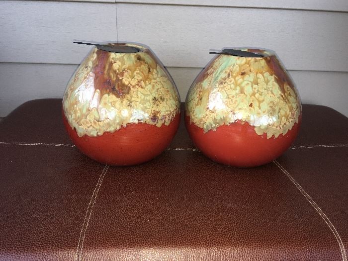 Large pottery candle holders with metal tops