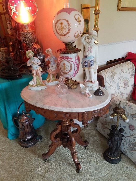 Oval Marble Top Table, Gone with the Wind Lamp. Bisque Figurines. 