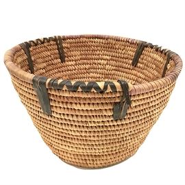 One of two bear grass and Yucca baskets from the Native American Papago peoples