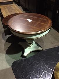 round wooden table with white base