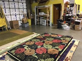 more of the larger rugs including this one on top from Garnet Hill