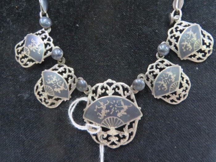 Sterling silver Siamese set, a necklace and matching earrings. 