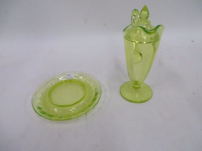Unusual and hard to find Vaseline glass covered pitcher and underplate.