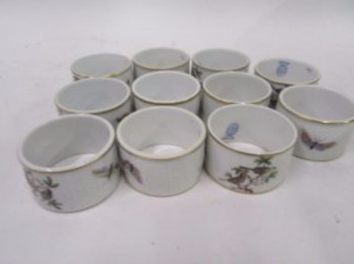 Herend napkin rings, eleven, signed with floral and bird decorations