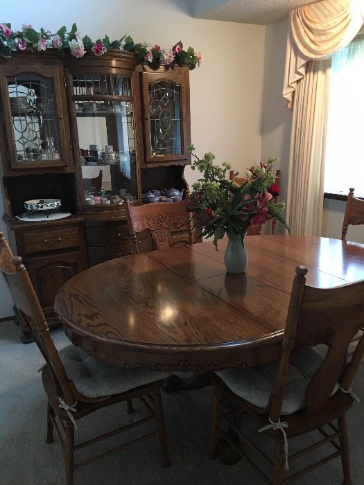 Dark wood dining table & china cabinet hutch