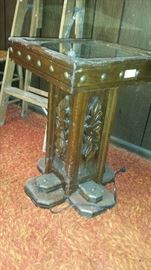 Lighted ornate pedestal