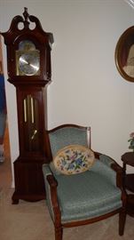 Cherry Howard Miller Grandmother Clock with Vintage Blue Upholstered Chair