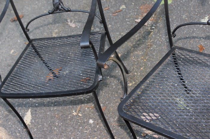 Pair of Wrought Iron Patio Chairs Comes with cushions shown in photos. Very nice condition.

Both chairs measure: 33 3/4"T x 22"W x 21"D


No rust, paint is virtually un-chipped. Cushions and chairs both in like-new condition, presumably kept indoors. Back of chair has wrought iron decorative floral design. 