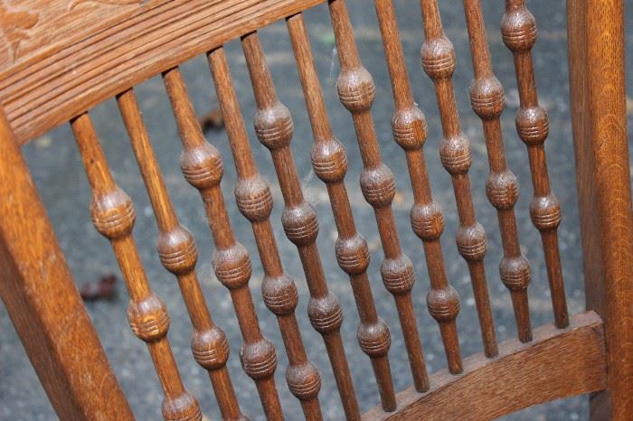 Antique Spindle Chair

Well kept in a non-smoking home. Very good condition.

Measures 37 1/2"T x 16 1/2"W x 15"D

Has a caned seat, undamaged. Made of oak.