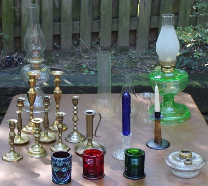 Oil Lamps and Candle Holder Variety

A beautiful and large collection of antique, vintage and brass oil lamps and candle holders. Charming decor and very useful as we approach shorter days. Green glass lamp is 18" to top of glass hurricane shade. Unique and rare cobalt oil candle is 7"t and fits perfectly in a glass holder.

NOTE: The Hobnail Candle holder that the Cobalt Oil Lamp sits in is NOT included in this lot, it is part of another Hobnail lot elsewhere in the auction.