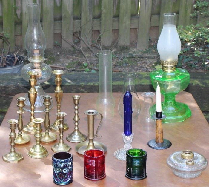 Oil Lamps and Candle Holder Variety

A beautiful and large collection of antique, vintage and brass oil lamps and candle holders. Charming decor and very useful as we approach shorter days. Green glass lamp is 18" to top of glass hurricane shade. Unique and rare cobalt oil candle is 7"t and fits perfectly in a glass holder.

NOTE: The Hobnail Candle holder that the Cobalt Oil Lamp sits in is NOT included in this lot, it is part of another Hobnail lot elsewhere in the auction.