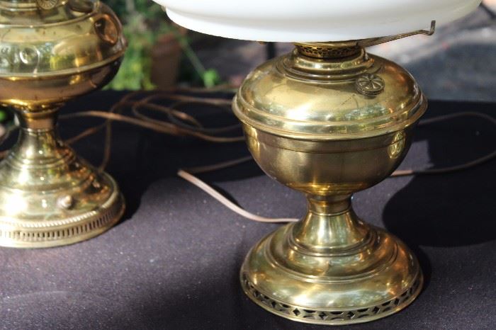 Trio of Vintage Brass Lamps with Floral Glass Shades

All three are tested and working. Very good condition, minimal wear of the brass. Thick white glass shades with floral illustrations. Two have inner decorative hurricane shades encompassing the lightbulb within the painted shades.

Fully assembled, they measure:
17 1/2"T, 21 1/2"T and 18 1/2"T