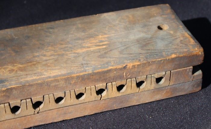 Antique Cigar Mold

Wood. Measures 2 1/2" tall when top and bottom are together. 21" long and 4 1/2"w.  Top is stamped "H.W. Erichs  Sole Agent 311-321 E. 11th St. N.Y." 