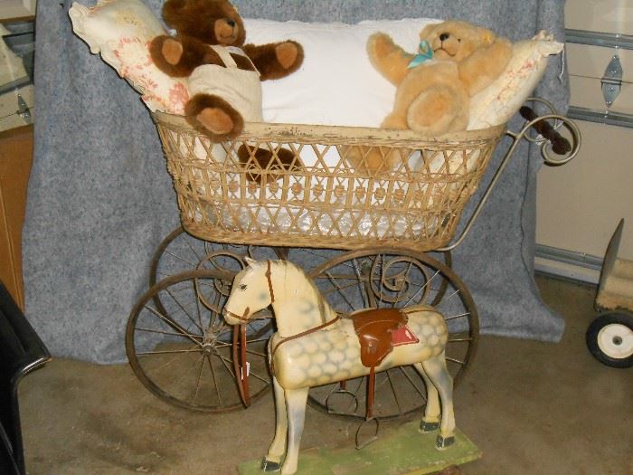 Euro. carriage, Steiff teddys,  and wooden horse