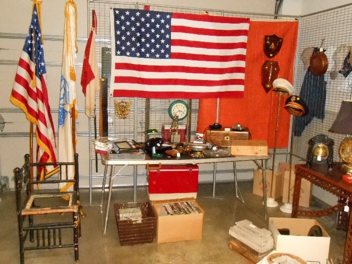 flags, militaria, and bamboo corner chair