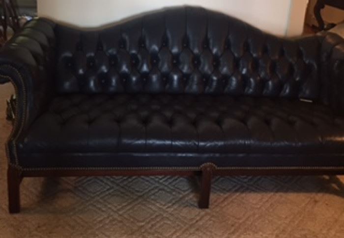 Camelback navy leather sofa