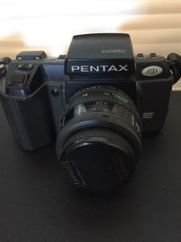 Pentax camera with lens