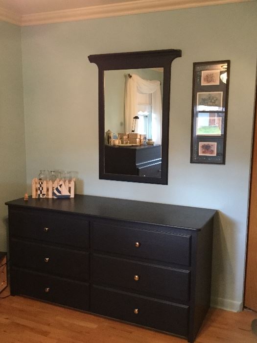 Custom-built bedroom set includes dresser and mirror, chest of drawers, headboard, and two nightstands.