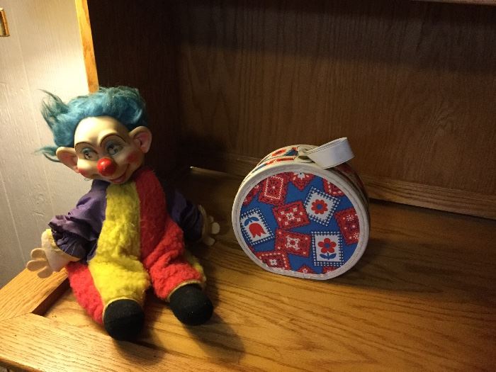 Vintage soft-bodied clown and vintage purse