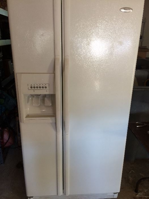 Newer 22 cubic ft Whirlpool Side by Side Refrigerator 