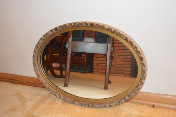 Gold gilt oval mirror (one of 2 antique oval mirros.)