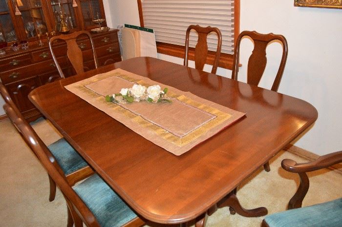 Stunning condition to this Ethan Allen rectangular table with two expansion leaves, 6 chairs, china cabinet, and tea cart!